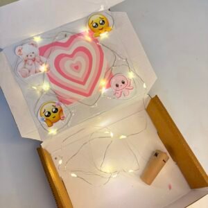 Add cute stickers + lights to your hamper
